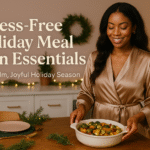 Confident Black woman in a silky champagne robe holding a dish of roasted vegetables in a cozy holiday kitchen with greenery and twinkle lights, next to the text “Stress-Free Holiday Meal Plan Essentials for a Calm, Joyful Holiday Season.”