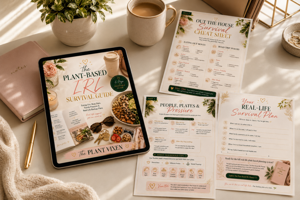  Plant-Based IRL Survival Guide printable pages displayed on a cozy desk with planning tools.