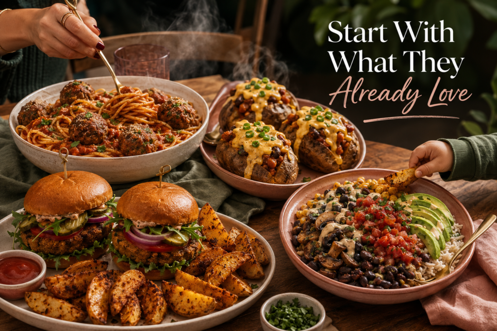 Family-style spread of plant-based spaghetti, veggie burgers, taco bowls and loaded potatoes.